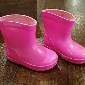 Bright pink rain boots
